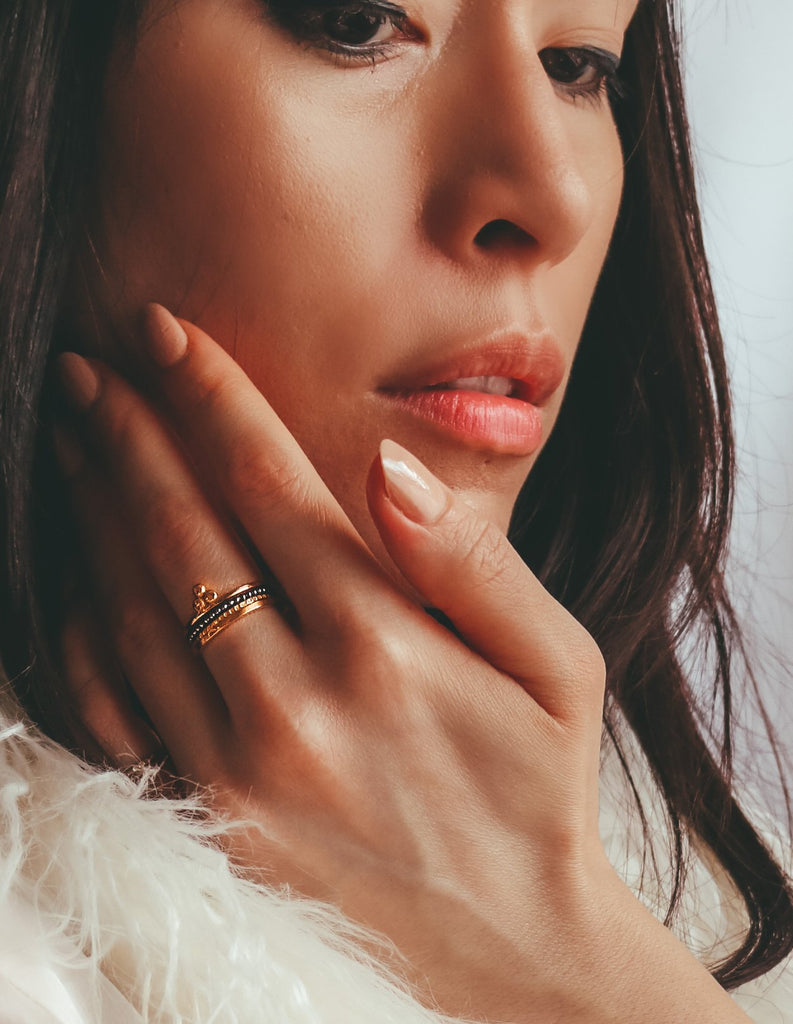 gold om ring by may hofman jewellery 