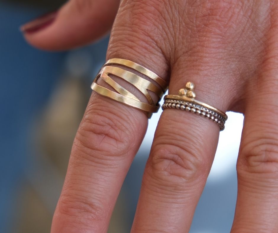 bronze om ring by may hofman