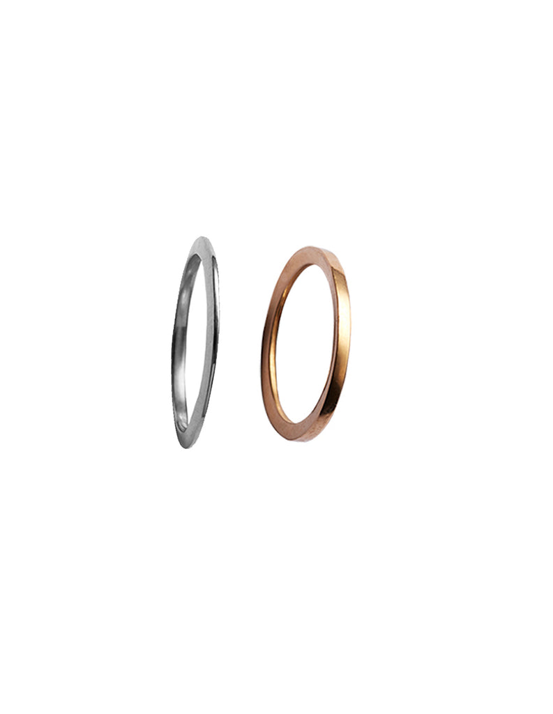 Gold Y ring and Silver X ring By May Hofman Jewellery 
